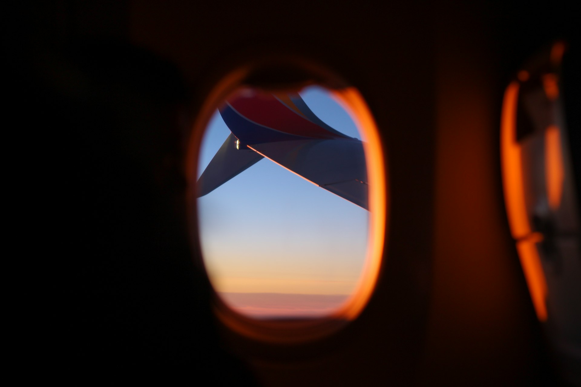 view of clouds through airplane window